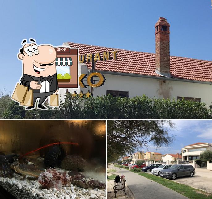 Puoi goderti l'aria fresca da seduto all'esterno di Hotel Niko