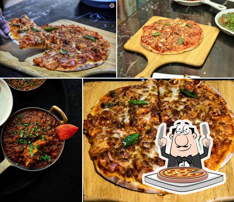 Get pizza at Cheeni Kum Restaurant - Kasba