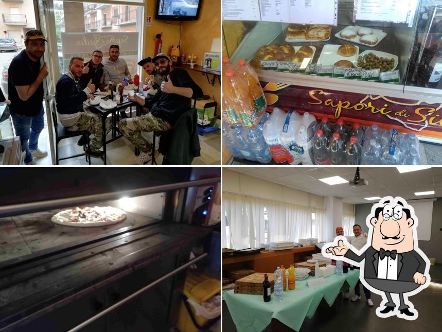 Dai un'occhiata agli interni di Pizzeria praia mare