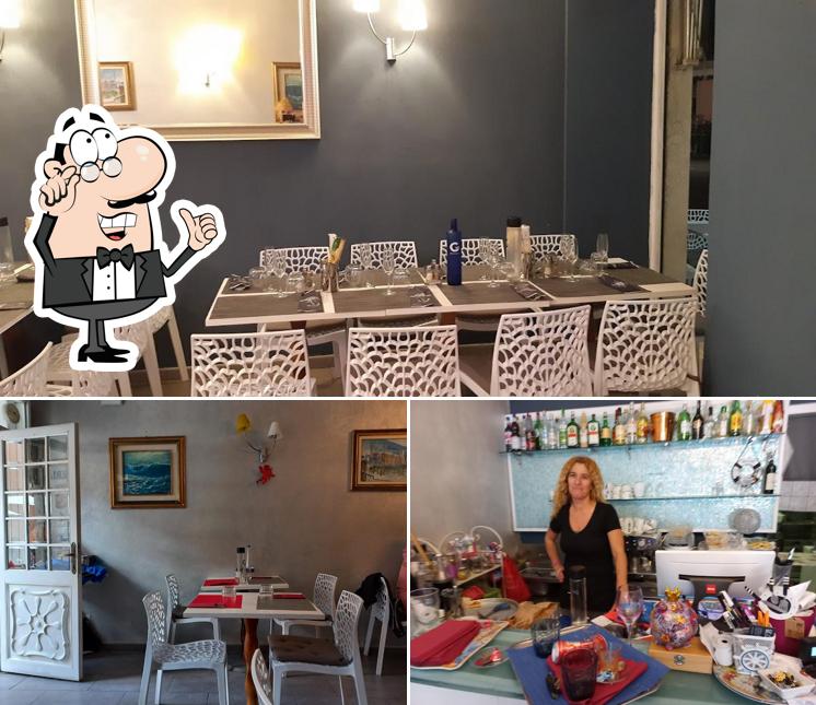 Dai un'occhiata agli interni di Pizzeria drink e food La Moreia