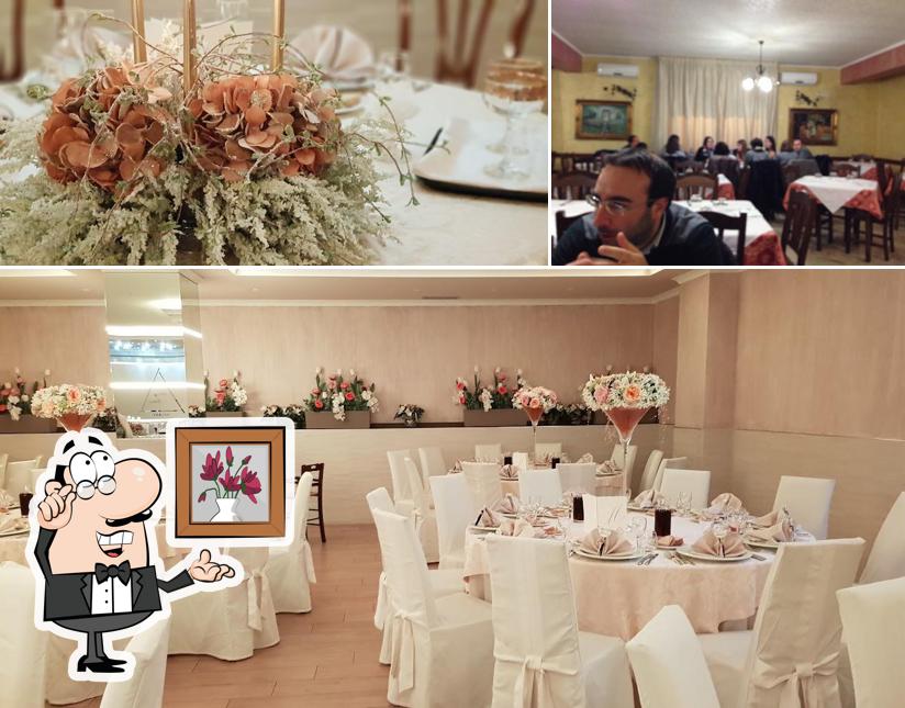 Dai un'occhiata agli interni di Mary Grace Sala Ricevimenti Ristorante E Pizzeria