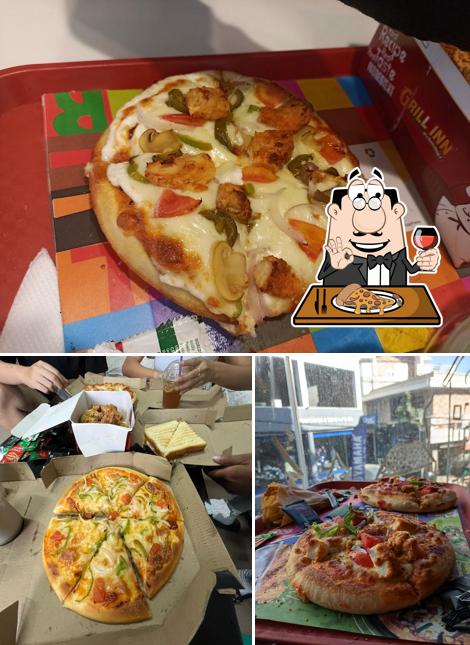 Try out pizza at Grill Inn