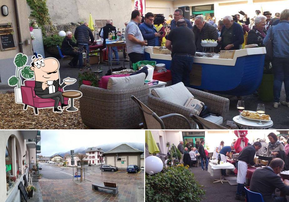 Questa è la foto che presenta la interni e esterno di Restaurant de Fully