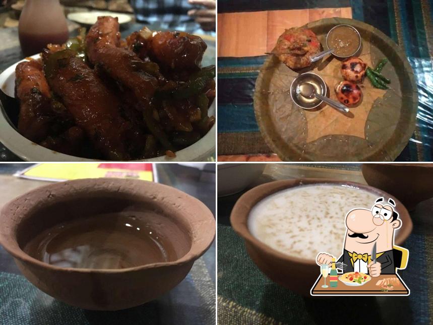 Among different things one can find food and drink at Potli Baati Chokha Restaurant