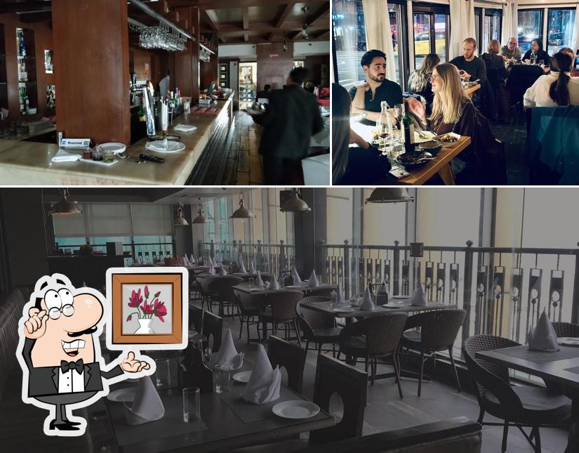 Take a seat at one of the tables at Moti Mahal Delux