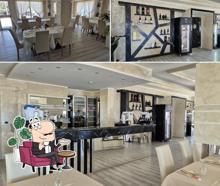 La foto di interni e esterno da Ristorante Pizzeria Isola dei Sapori