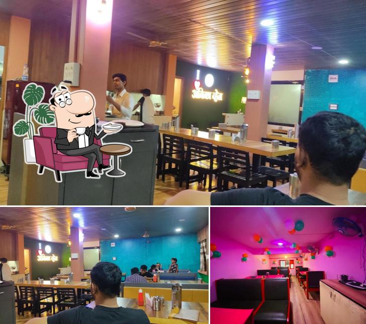 The interior of Hotel Ambika Veg Family Restaurant