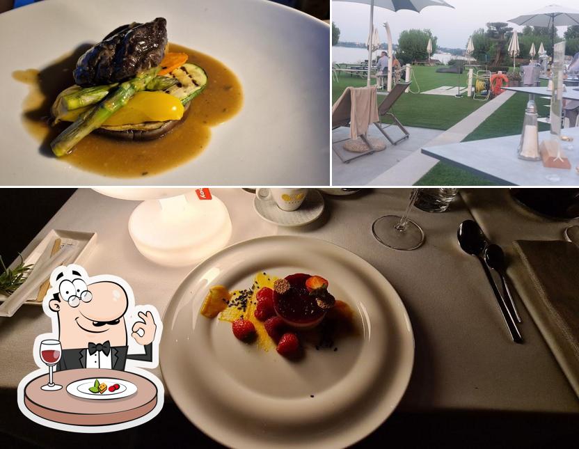 La foto di cibo e interni da Ristorante Aura Peschiera del Garda