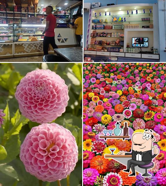 Take a seat at one of the tables at Sharma Sweet Shop