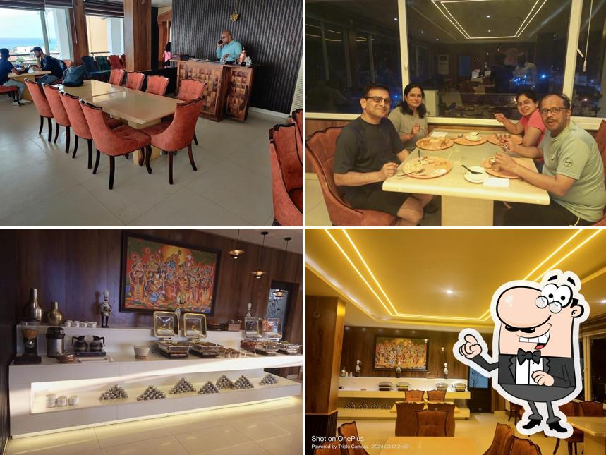 Take a seat at one of the tables at The Seashore Hotel