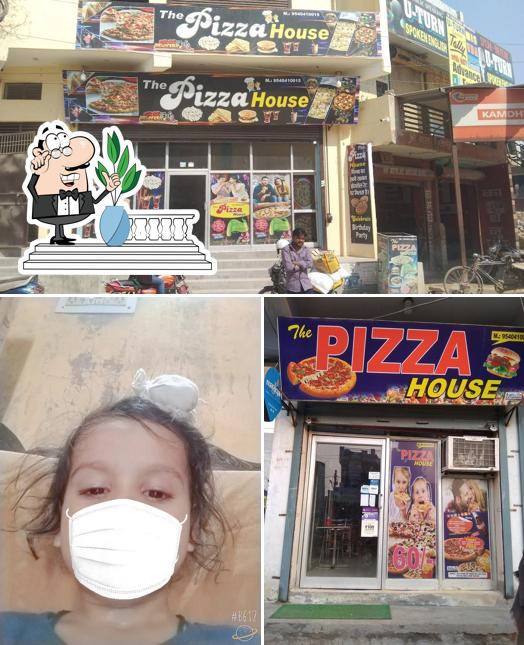 The exterior of The pizza House Mubarak