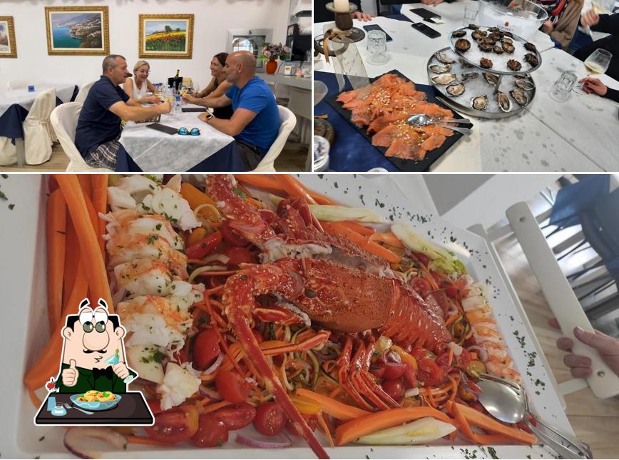 Questa è la immagine che mostra la cibo e interni di Ristorante Gastronomia Pescheria Grotta Rossa