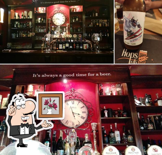 Siediti a un tavolo di Hops Pub