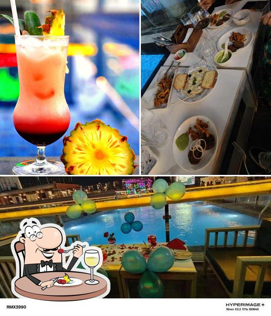 Among various things one can find food and interior at Canopy Rooftop Lounge