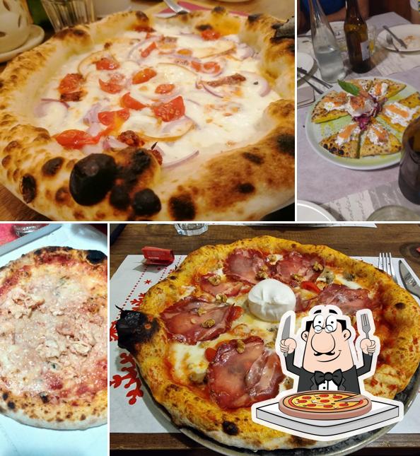 Prenditi una pizza a Punto Caldo Fast Food