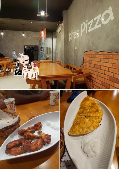 Check out the photo displaying food and interior at Kites pizza