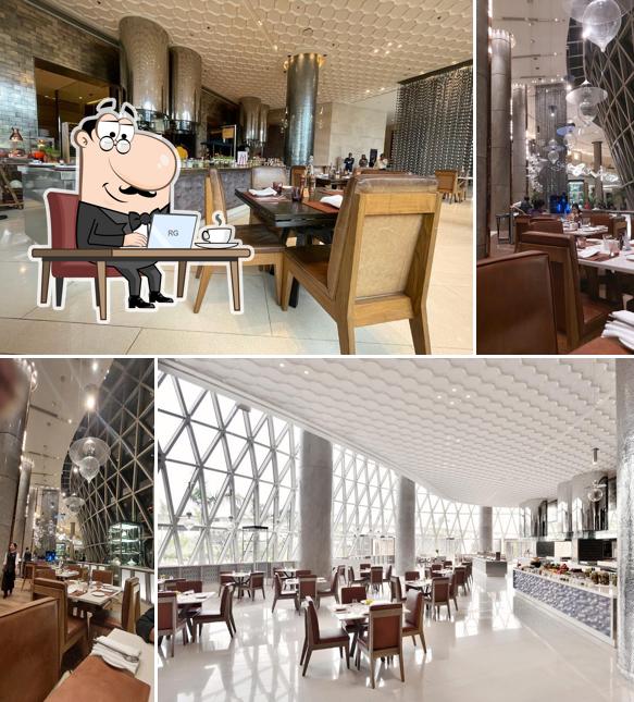 Take a seat at one of the tables at JW KITCHEN