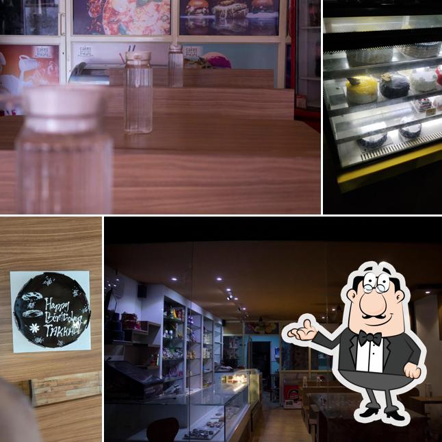 Take a seat at one of the tables at Cakes & Treats