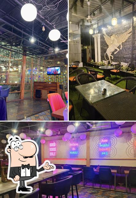 Take a seat at one of the tables at Kalika haveli