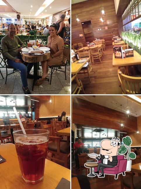 Sente em uma das mesas no Madero Steak House - Salvador Shopping