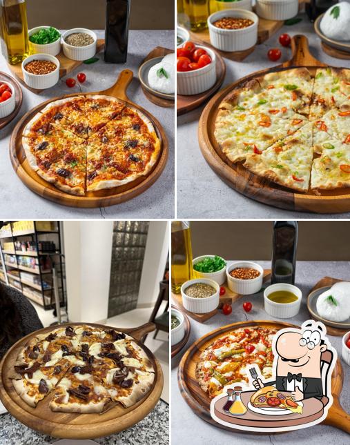 Get pizza at Fresh Aisle Cafe
