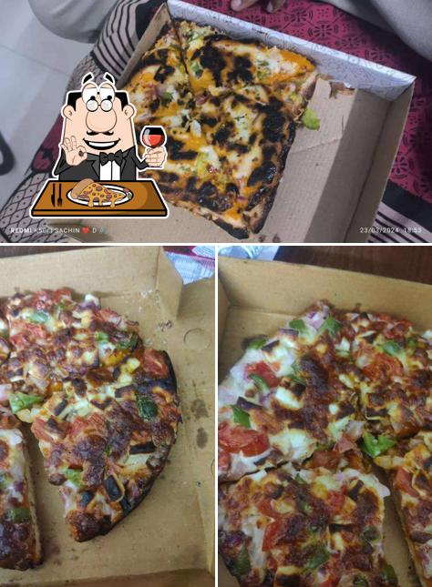 Pick pizza at FOOD TOWN BY MAHESHWARI'S