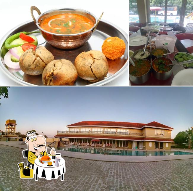 The photo of food and exterior at Palm Villa Club