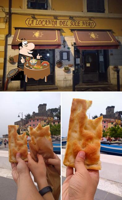 Tra le varie cose da Panetteria Focacceria Rizzoli si possono trovare la cibo e interni