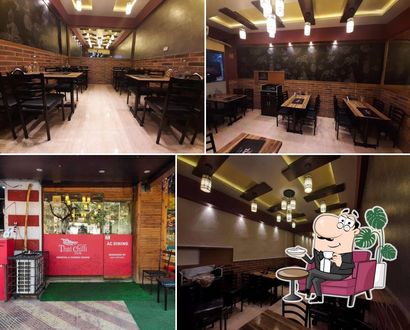Take a seat at one of the tables at Thai Chilli China mira road