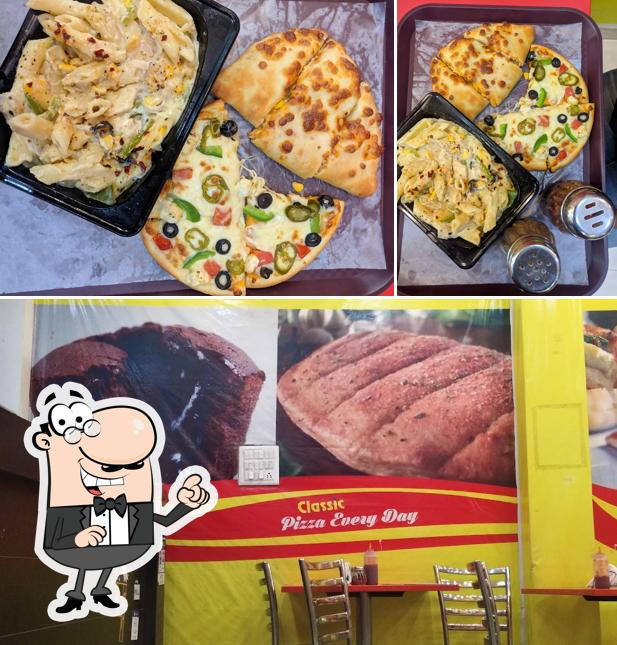 Take a seat at one of the tables at Classic pizza Everyday