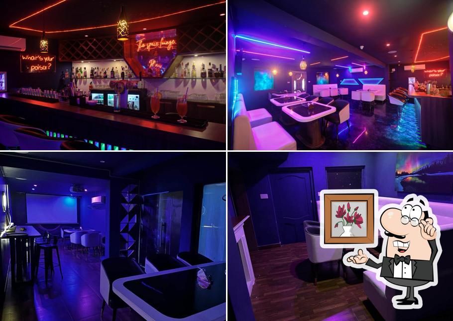 Take a seat at one of the tables at The Space Lounge Bar