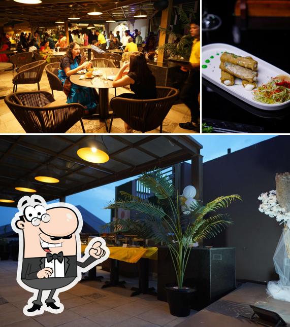 Among various things one can find interior and food at The Upper Story - Skydeck & Lounge