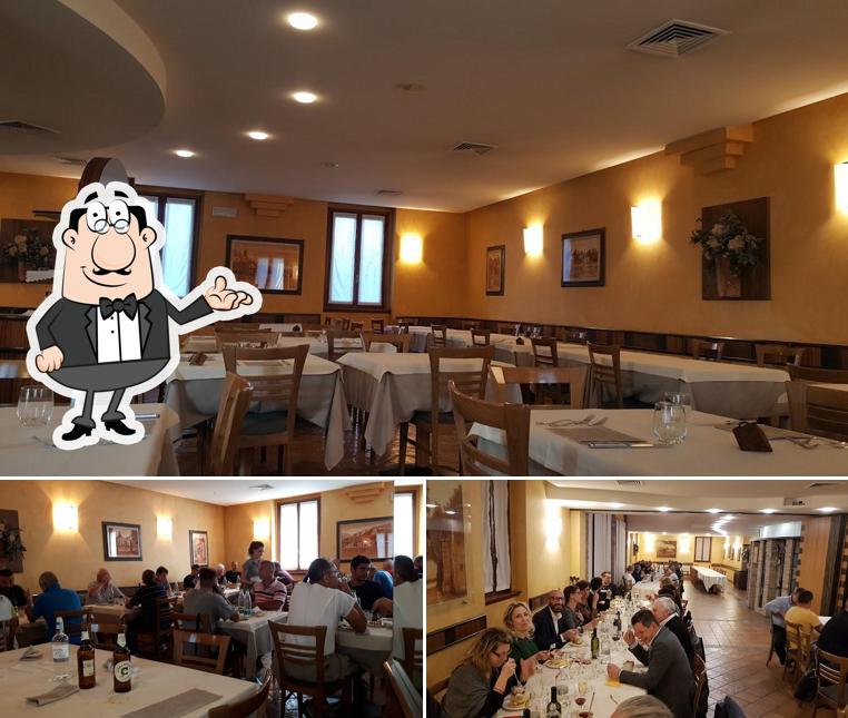 Dai un'occhiata agli interni di Ristorante Capanna