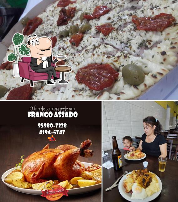 Esta é a foto apresentando interior e pizza no Pizzaria Nova Opção