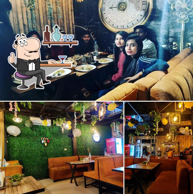 Take a seat at one of the tables at Wonderful Cafe and Lounge