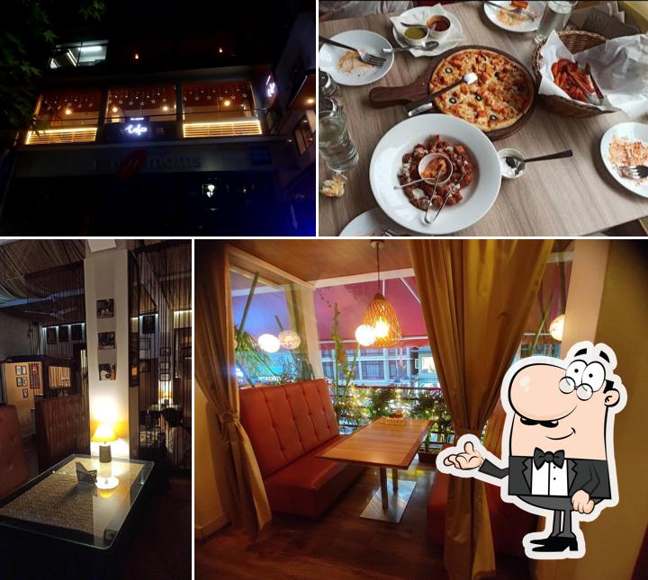 Take a seat at one of the tables at The Square Family Restaurant and Bar