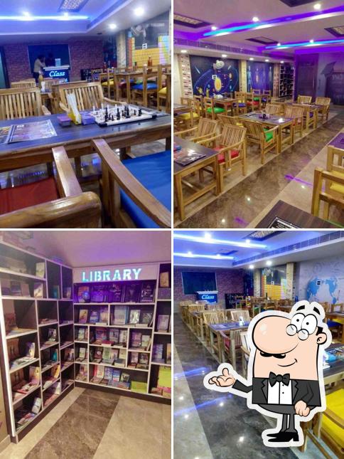 Take a seat at one of the tables at Class Bunk Cafe