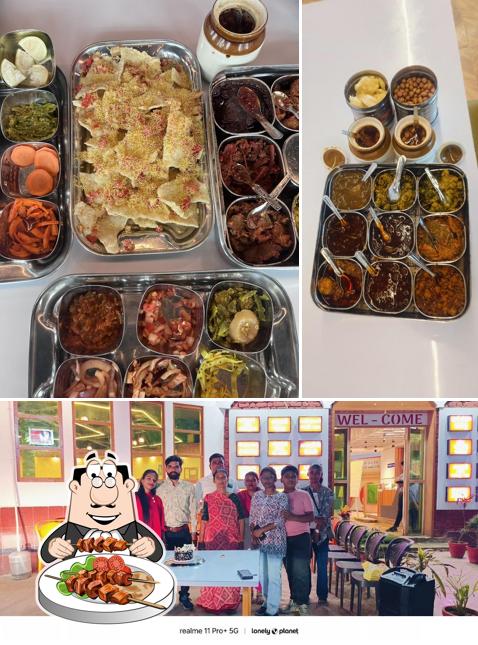 Among different things one can find food and interior at Jay Khodiyar Kathiyawadi Dhaba