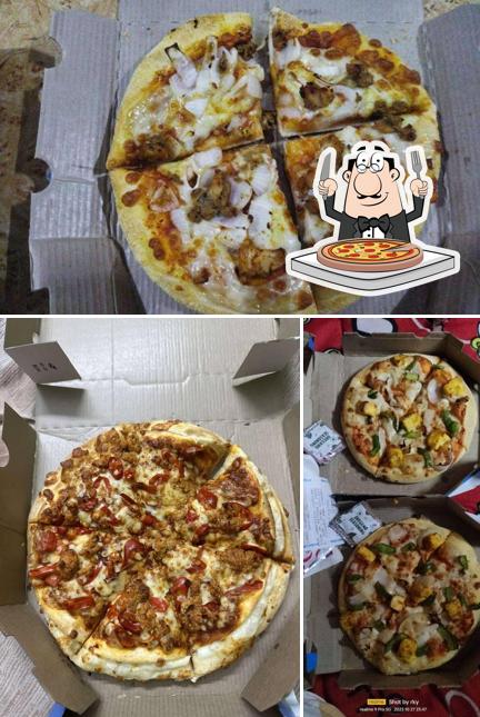 Try out pizza at Domino's pizza