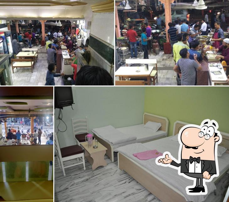 Take a seat at one of the tables at Madina Hotel