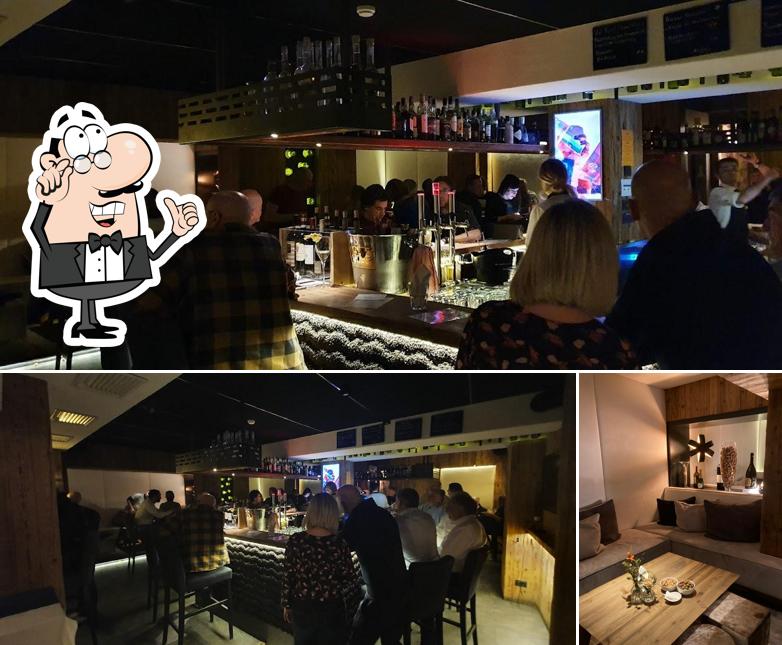 Dai un'occhiata agli interni di Toccami Wine-Bar Cocktail-Lounge