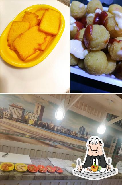 Tra le diverse cose da Pizzeria Malecon si possono trovare la cibo e interni