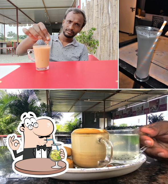 Take a look at the photo depicting drink and food at THE DESTINI RESTAURANT