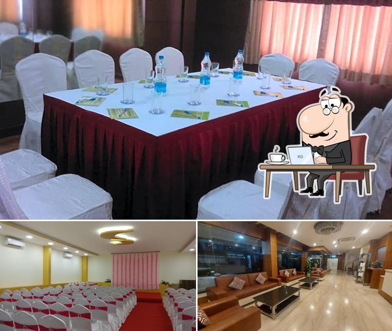 Take a seat at one of the tables at PRINCE GARDENS HOTEL