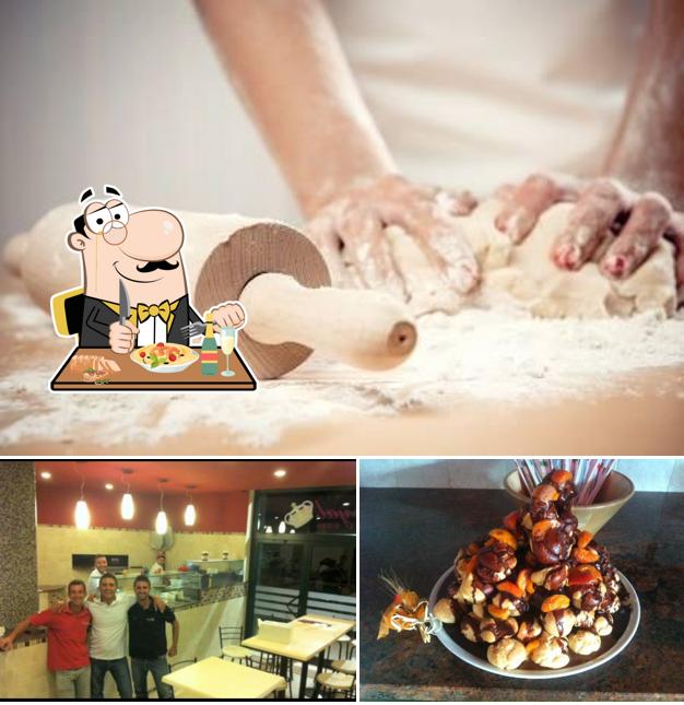 Questa è la immagine che mostra la cibo e interni di Royal Pizza