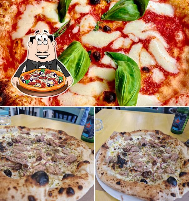 A Arcade Pizzeria, puoi prenderti una bella pizza