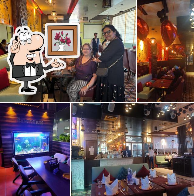 Take a seat at one of the tables at Symposium World Cuisine