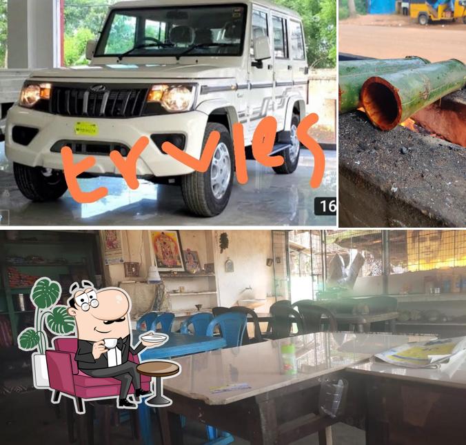 Take a seat at one of the tables at sri varalakshmi durga hotel