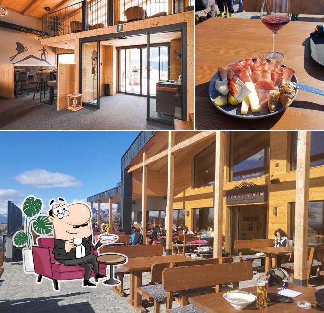 Questa è la immagine che raffigura la interni e tavolo da pranzo di Franzin Alm