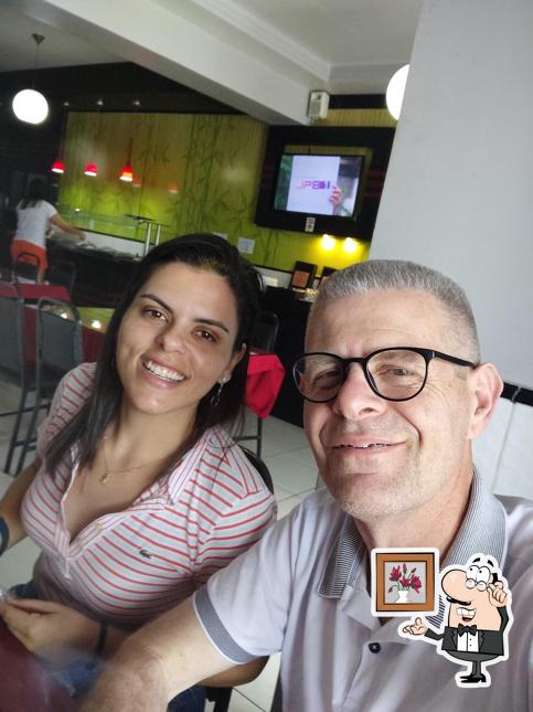 O interior do VILLA CONTEMPORÂNEA PIZZARIA